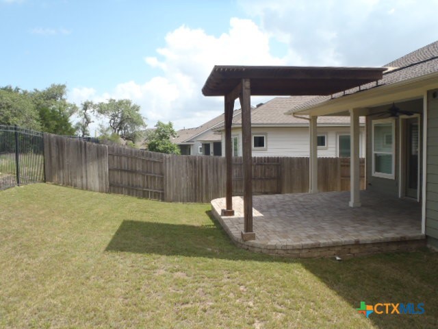 791 Hazy Hills Loop Dripping Springs, TX 78620 - Photo 11 of 44 a view of a backyard with a slide