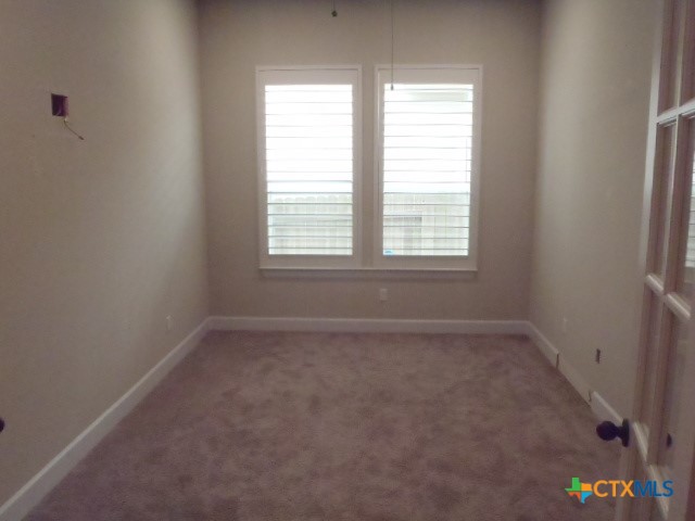 791 Hazy Hills Loop Dripping Springs, TX 78620 - Photo 33 of 44 an empty room with a window