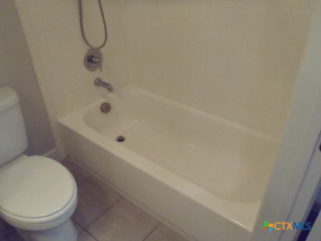 791 Hazy Hills Loop Dripping Springs, TX 78620 - Photo 39 of 44 a bathroom with a toilet and a shower