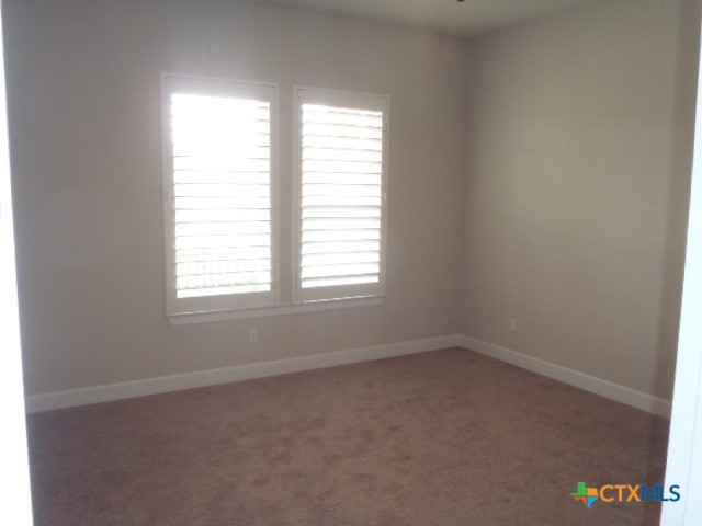 791 Hazy Hills Loop Dripping Springs, TX 78620 - Photo 40 of 44 an empty room with a window