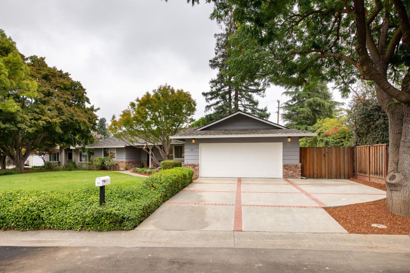 981 Thatcher Drive Los Altos, CA 94024 - Photo 4 of 30 a front view of a house with a yard