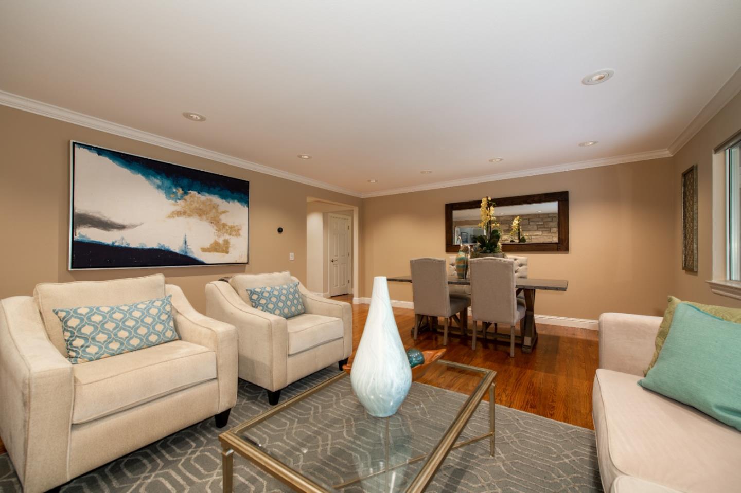 981 Thatcher Drive Los Altos, CA 94024 - Photo 7 of 30 a living room with furniture and a flat screen tv