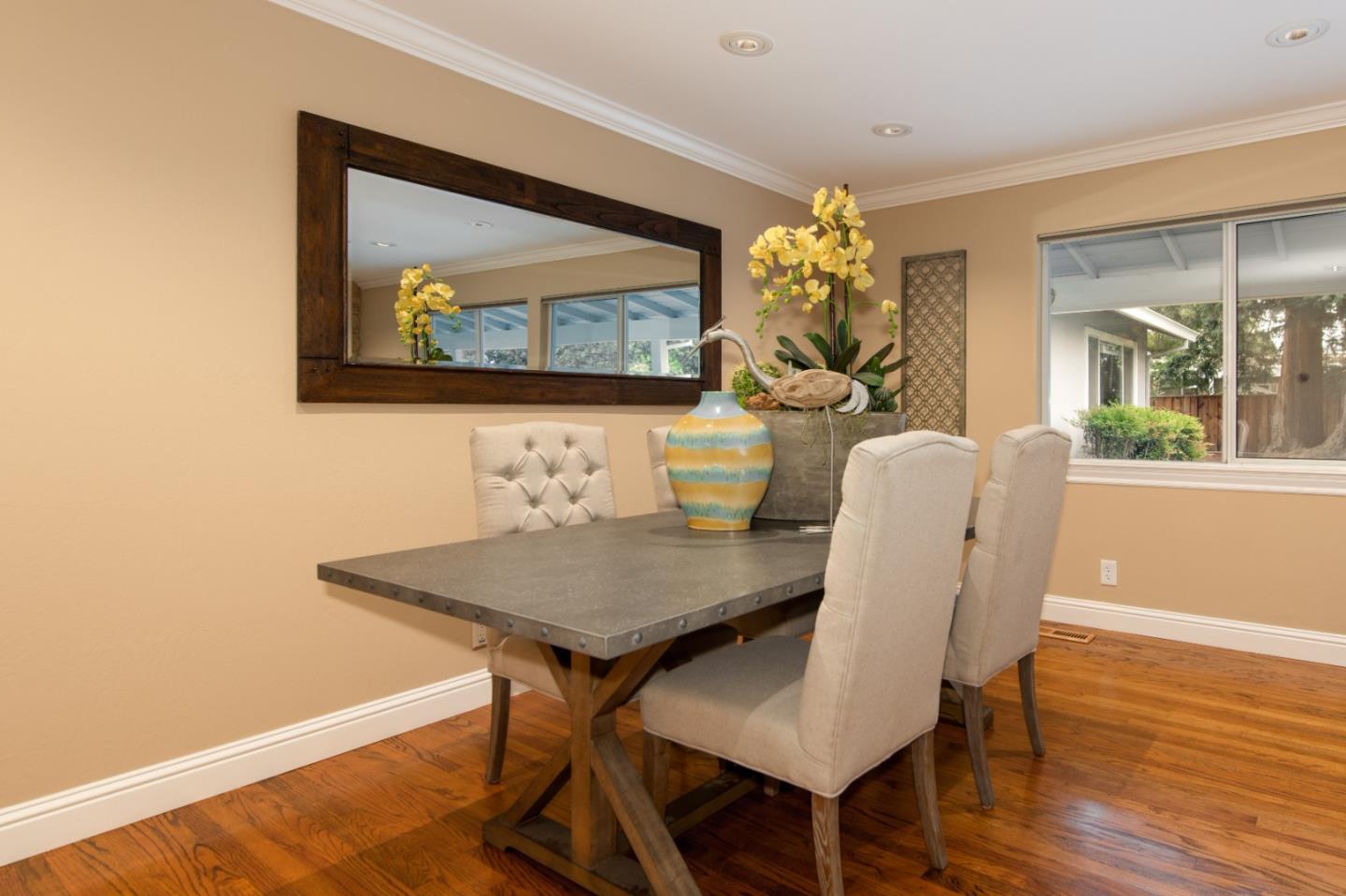 981 Thatcher Drive Los Altos, CA 94024 - Photo 10 of 30 a view of a dining room with furniture and wooden floor