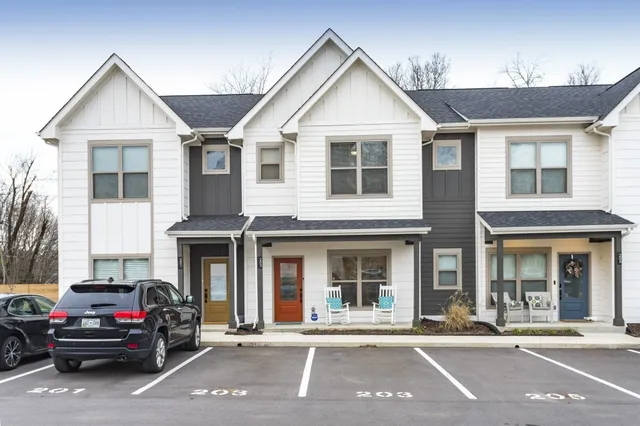 a car parked in front of a house
