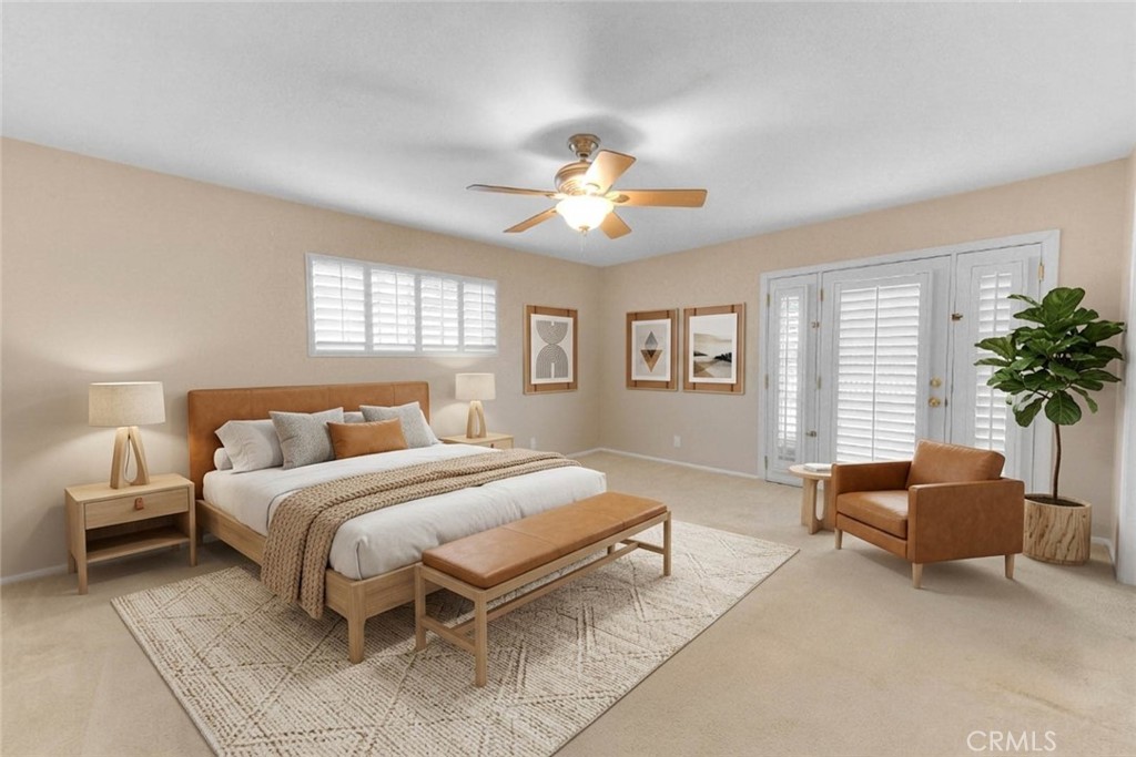 30673 Del Rey Road Temecula, CA 92591 - Photo 27 of 47 Very Spacious Primary Bedroom. Entry Door Leads To Rear Yard. Plush Carpeting. Overhead Fan For Cooling Breeze.