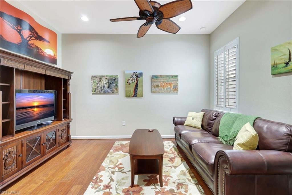 9508 Ironstone Terrace, Unit 201 Naples, FL 34120 - Photo 28 of 45 Living area with ceiling fan, light wood-style flooring, and recessed lighting
