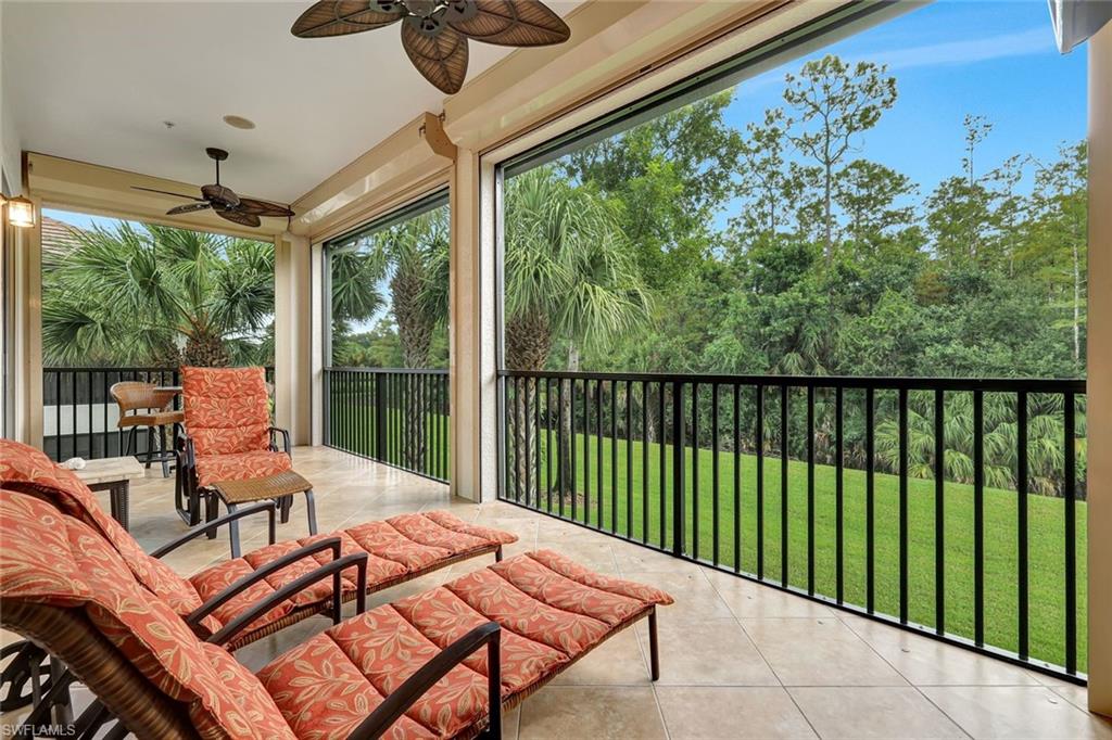 9508 Ironstone Terrace, Unit 201 Naples, FL 34120 - Photo 31 of 45 Sunroom / solarium featuring tile patterned flooring and healthy amount of natural light