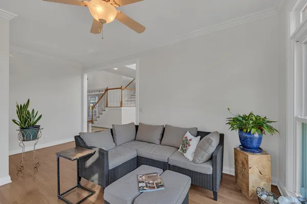 a spacious bedroom with a bed and a window