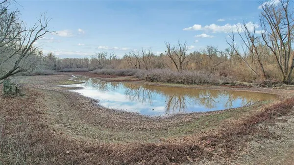 a view of a lake with a city
