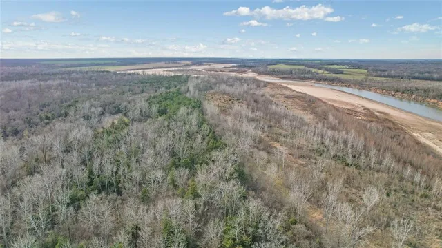 a view of an ocean beach and mountain