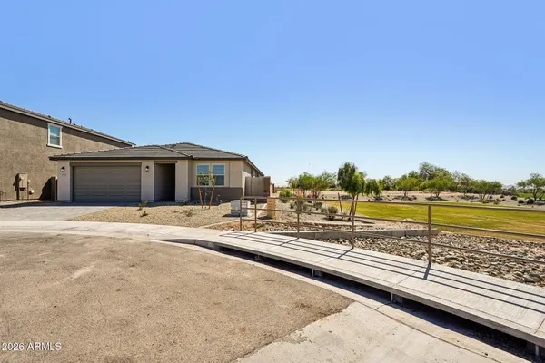 a view of a chairs and tables in the patio