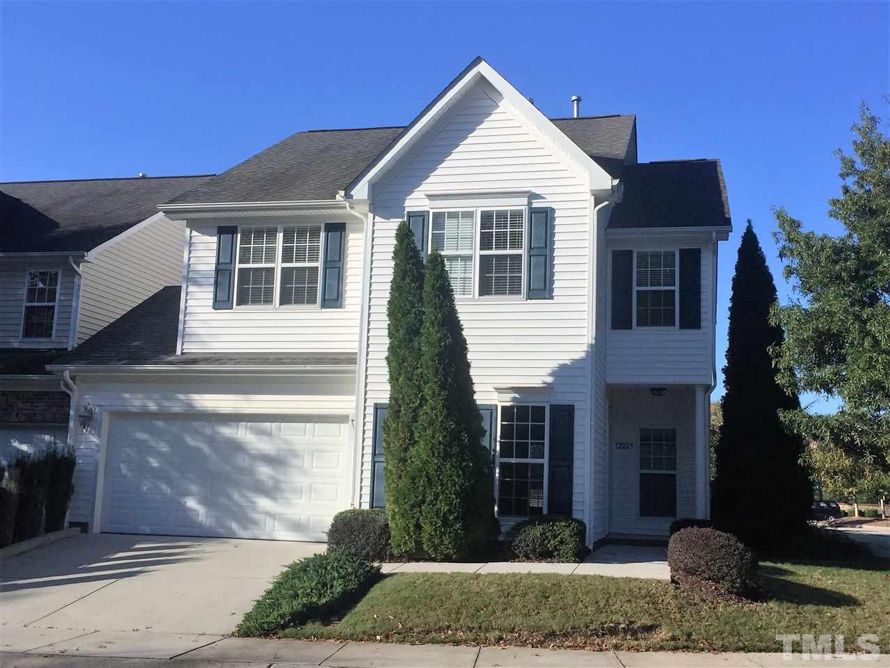12223 Fox Valley Street Raleigh, NC 27614 - Photo 1 of 25 a front view of a house with garden