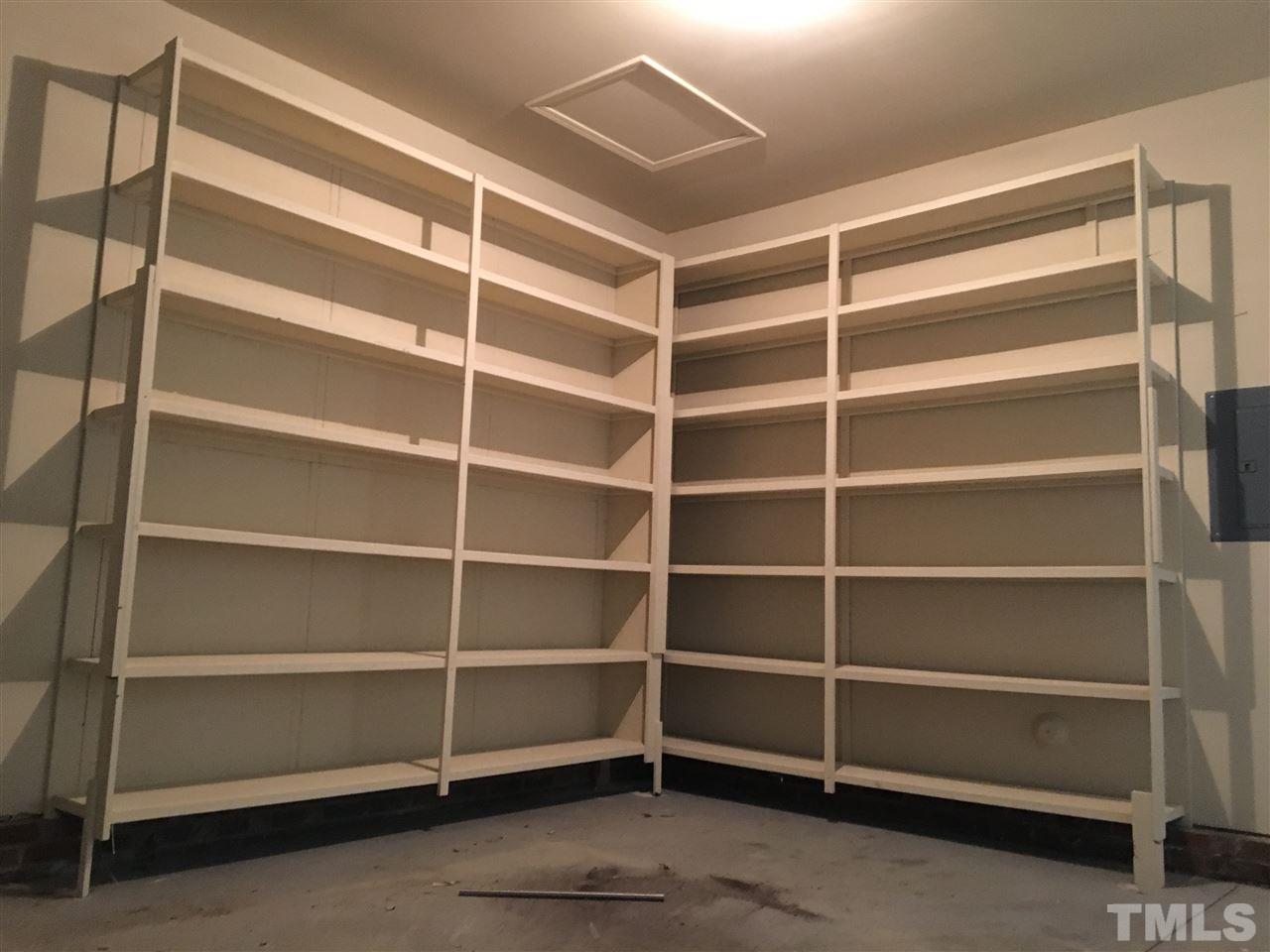 12223 Fox Valley Street Raleigh, NC 27614 - Photo 21 of 25 a view of an empty room with empty racks