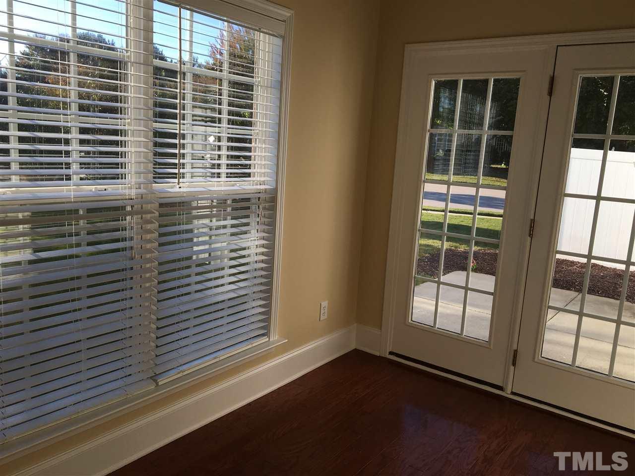 12223 Fox Valley Street Raleigh, NC 27614 - Photo 10 of 25 a view of empty room with windows