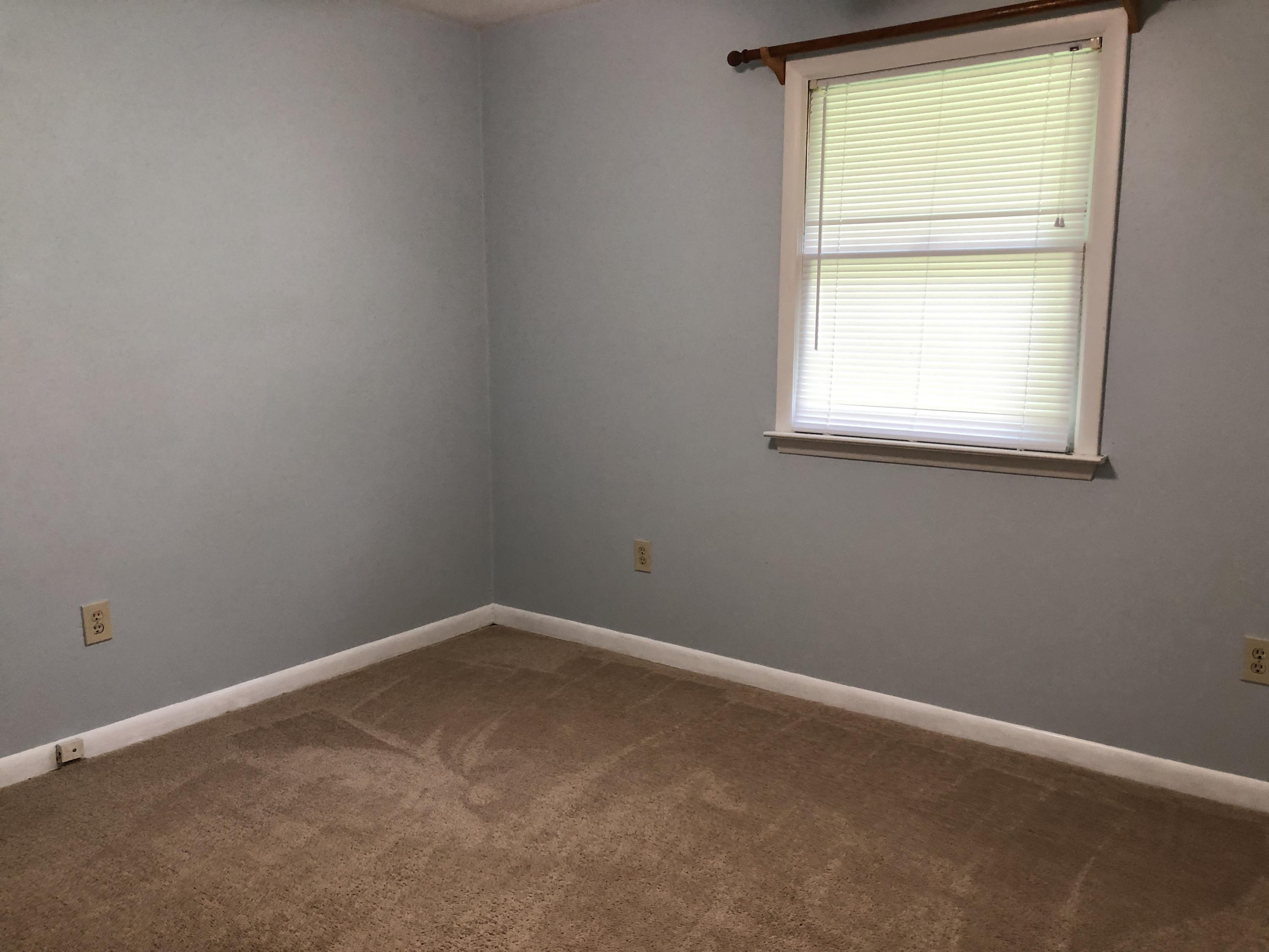 1325 Iron Ridge Road Rocky Mount, VA 24151 - Photo 12 of 17 an empty room with a window