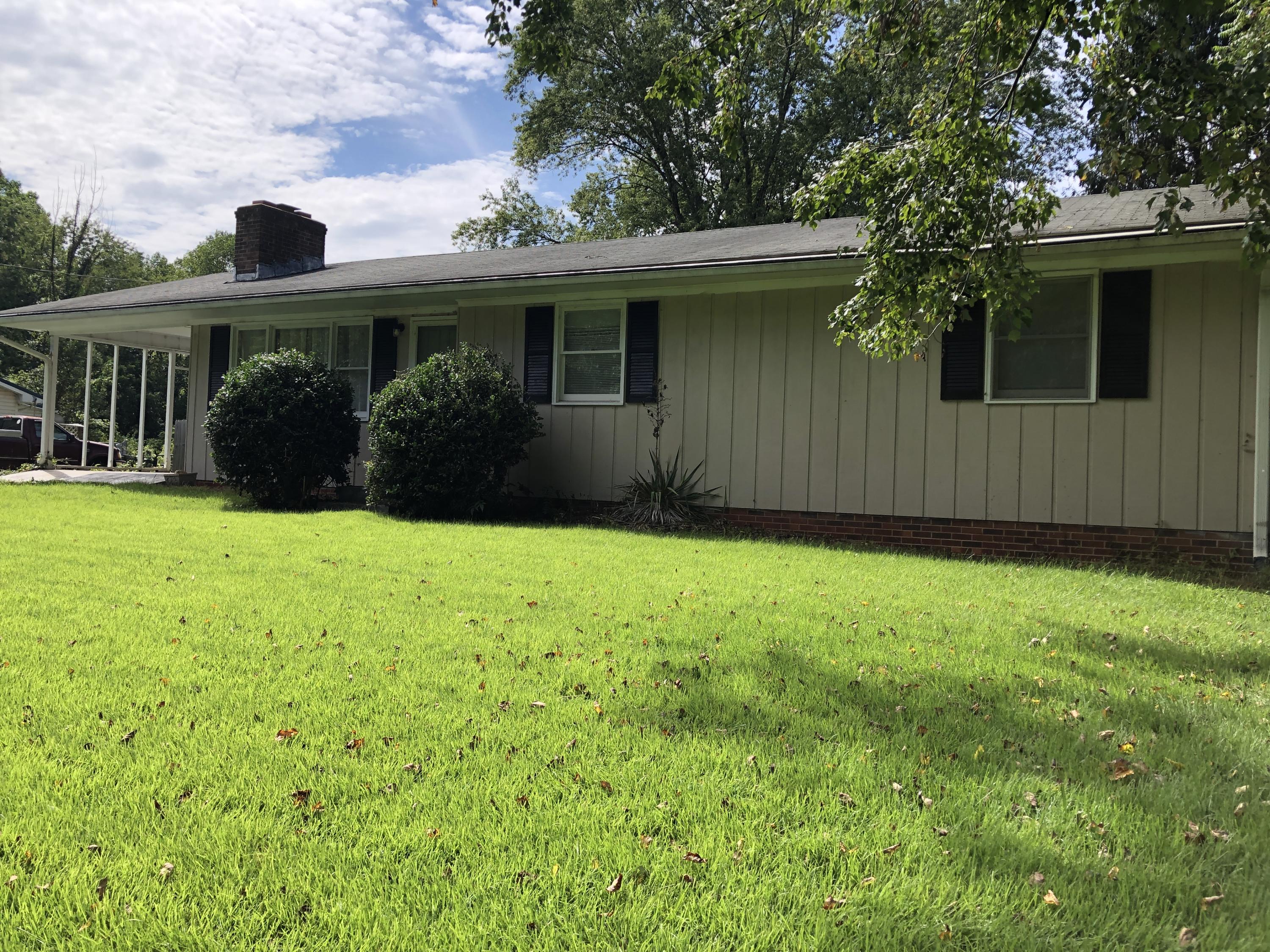 1325 Iron Ridge Road Rocky Mount, VA 24151 - Photo 3 of 17 a front view of house with yard and green space
