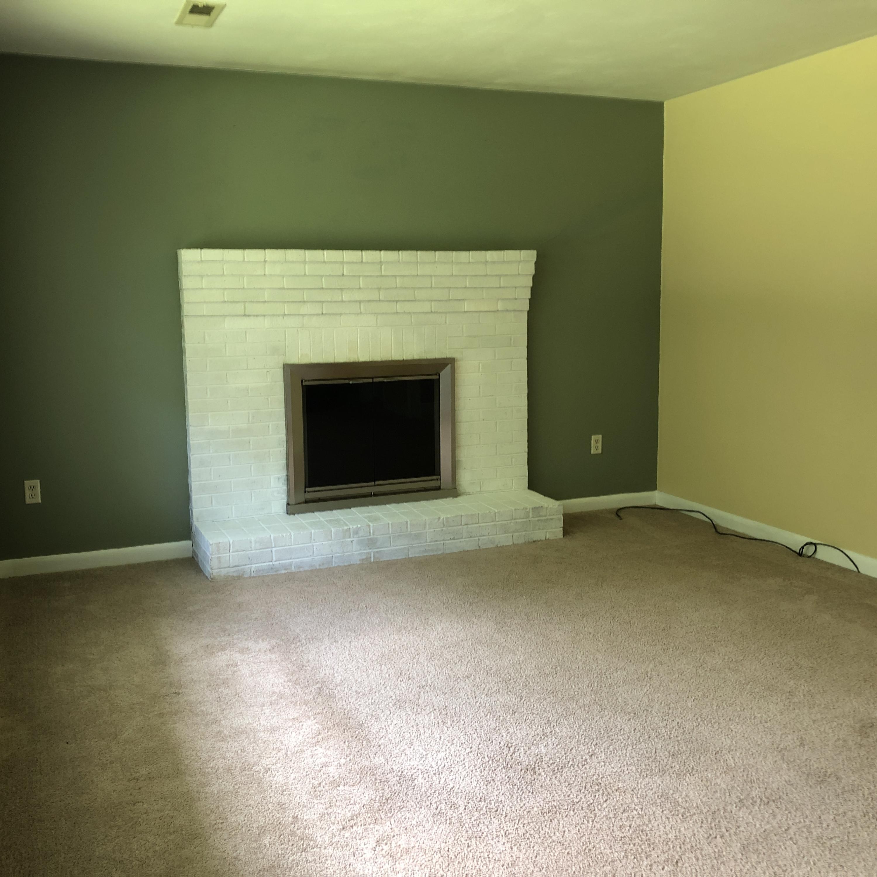 1325 Iron Ridge Road Rocky Mount, VA 24151 - Photo 7 of 17 a view of empty room with a fireplace