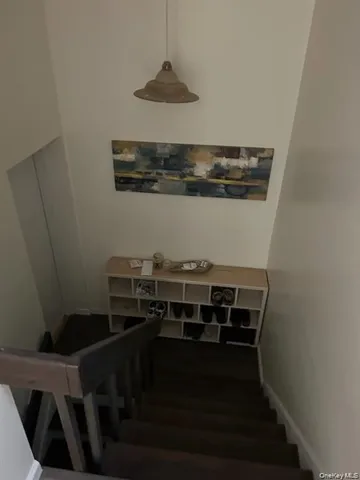 a view of table and chairs in a room