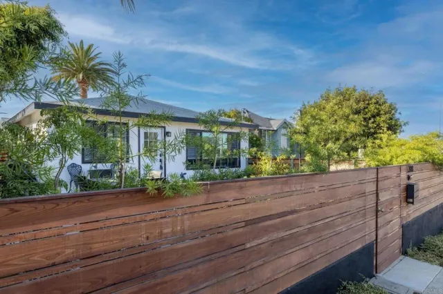 a view of a house with a street