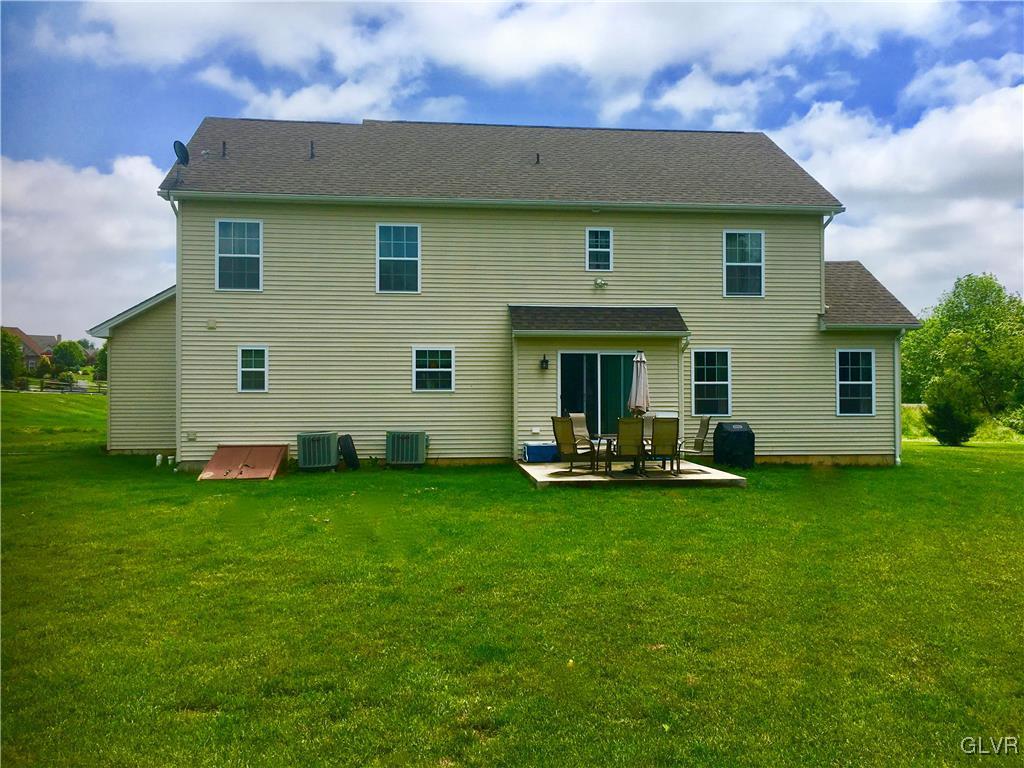 146 Fox Ridge Nazareth, PA 18064 - Photo 5 of 24 a view of a house with backyard sitting area and garden