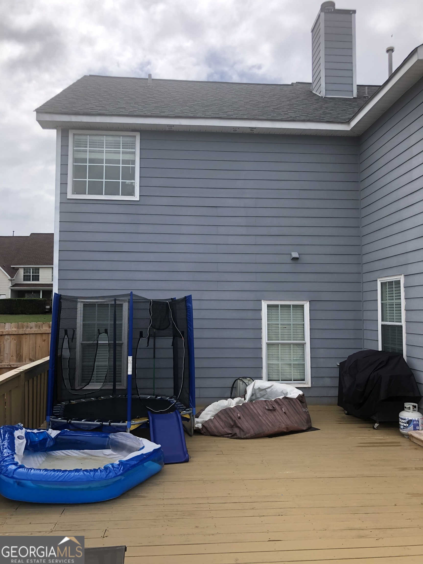 25 Franklin Way Covington, GA 30016 - Photo 15 of 54 a view of a house with a patio