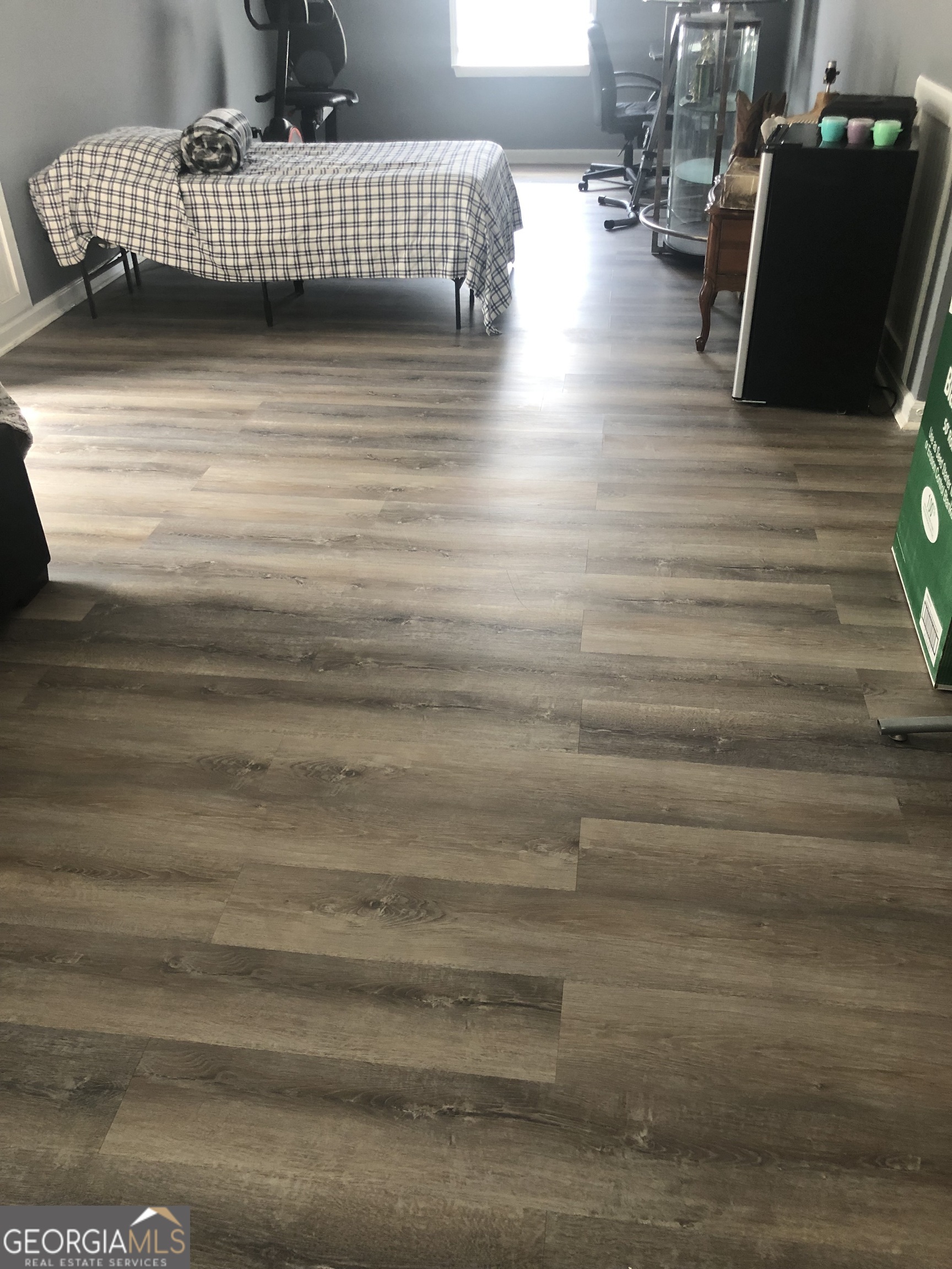 25 Franklin Way Covington, GA 30016 - Photo 19 of 54 a view of entryway with wooden floor