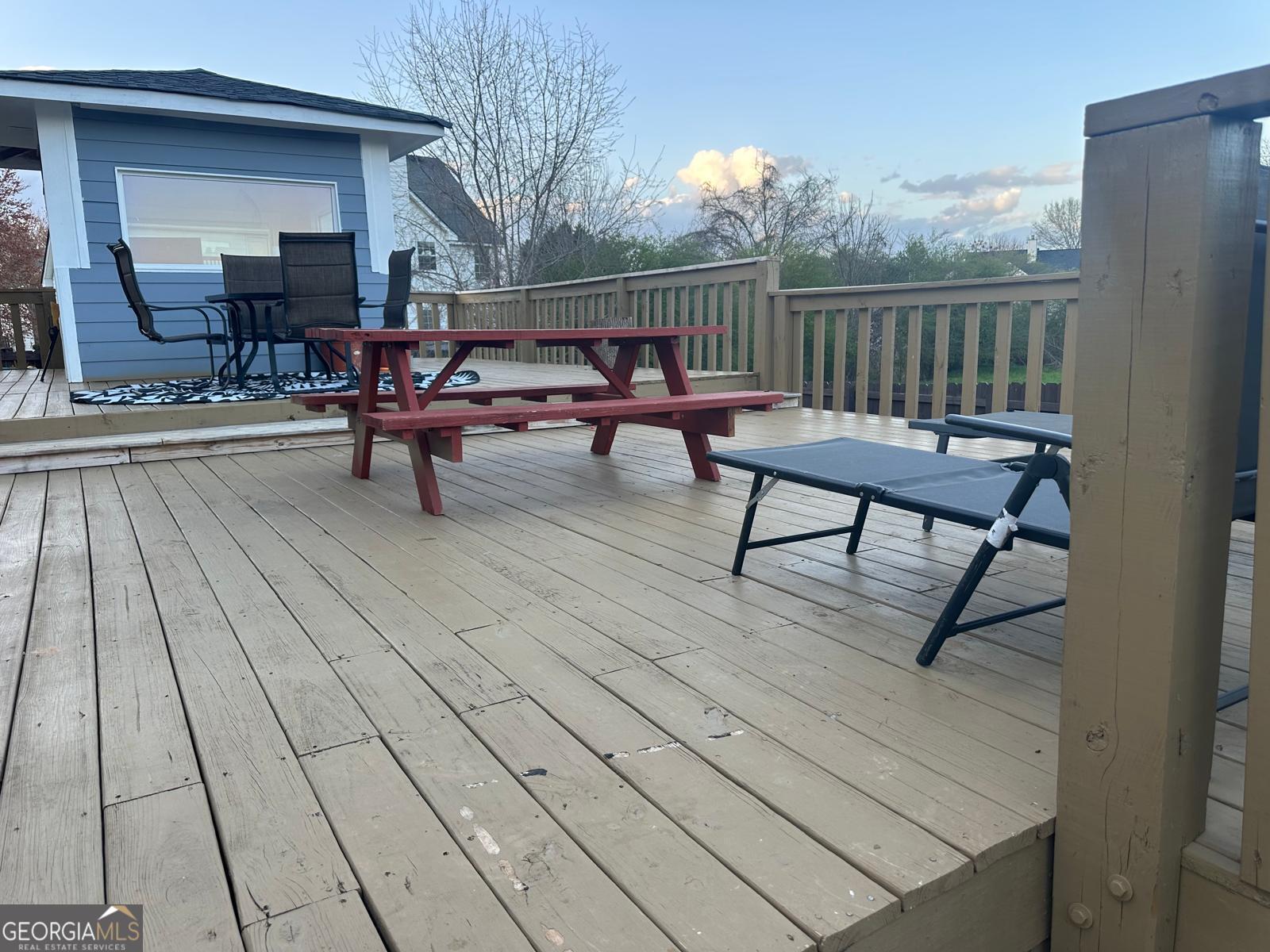 25 Franklin Way Covington, GA 30016 - Photo 35 of 54 a view of a chairs and tables in the balcony