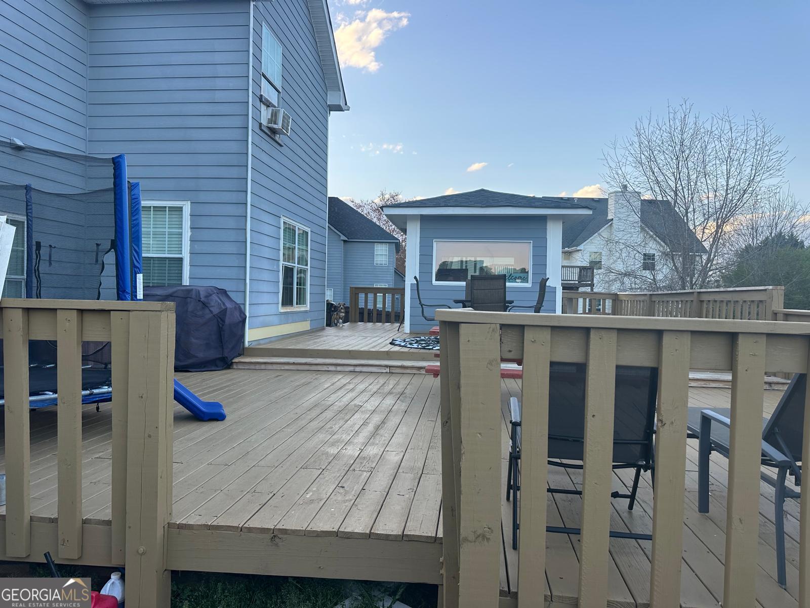 25 Franklin Way Covington, GA 30016 - Photo 41 of 54 a view of a house with backyard and furniture