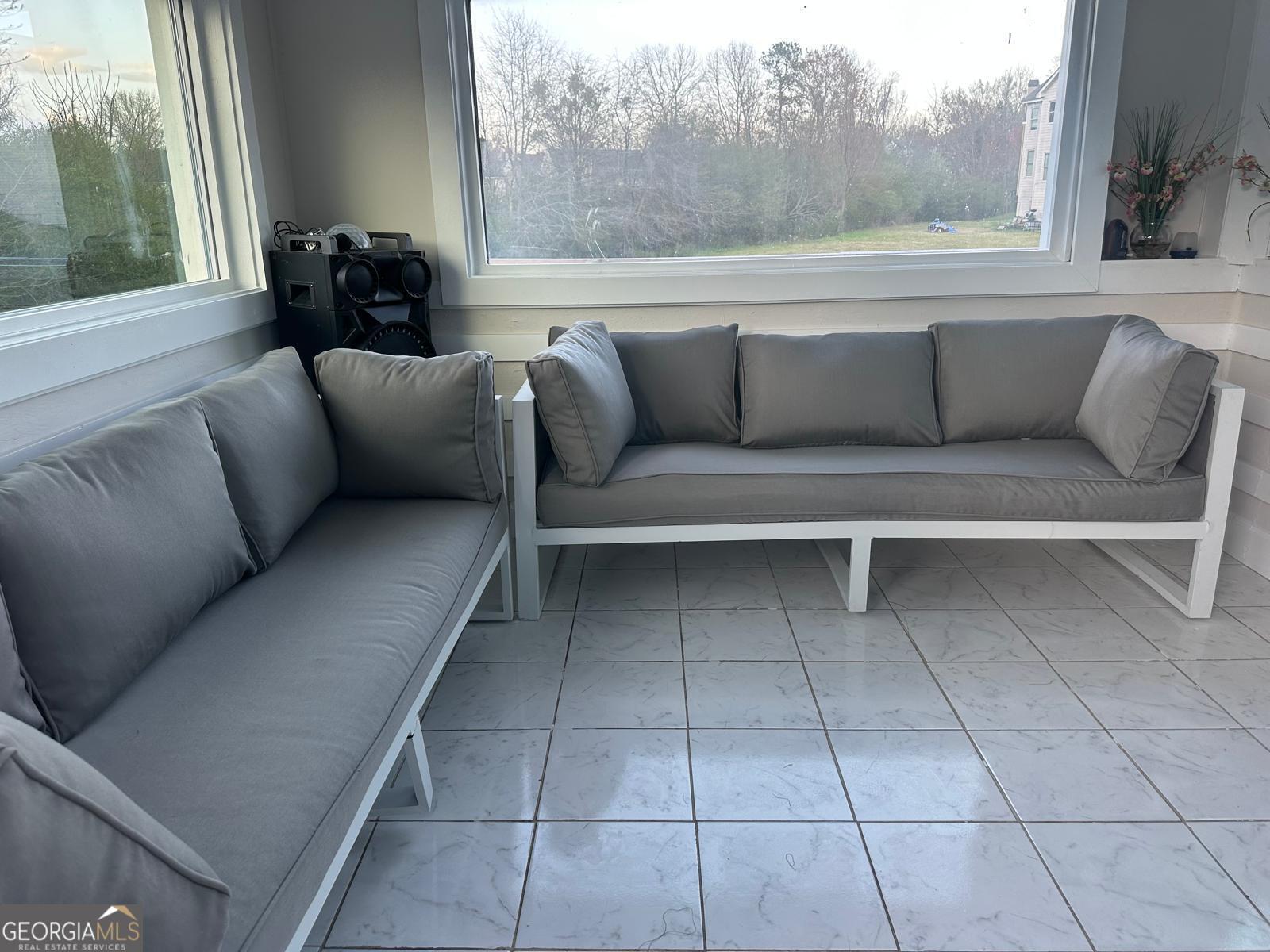 25 Franklin Way Covington, GA 30016 - Photo 44 of 54 a view living room with furniture and a window