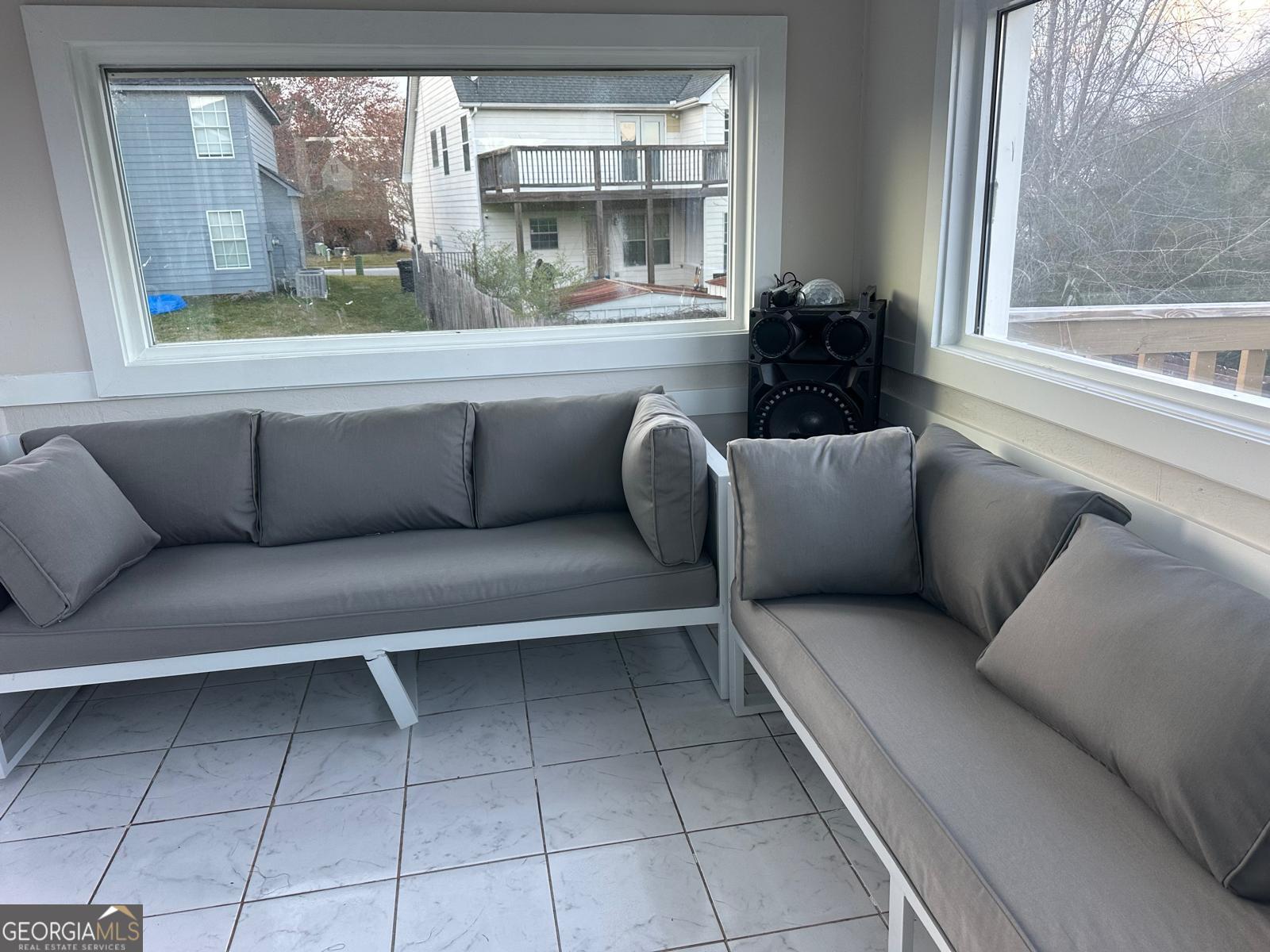 25 Franklin Way Covington, GA 30016 - Photo 47 of 54 a living room with furniture and a window