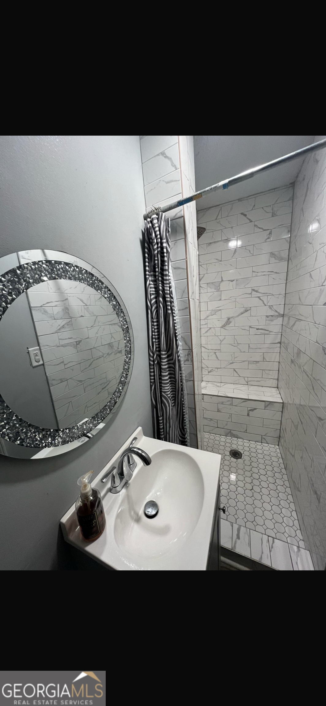 25 Franklin Way Covington, GA 30016 - Photo 52 of 54 a view of bathroom with a sink and glass door