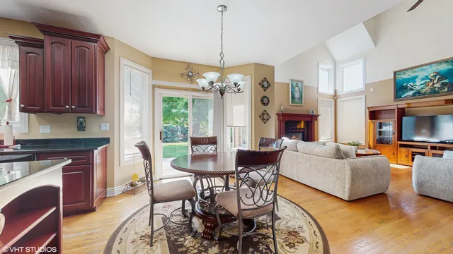 a view of a livingroom with furniture window and wooden floor