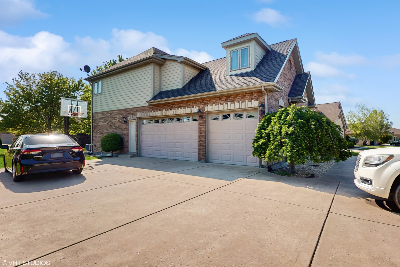 17040 Cheyenne Court Lockport, IL 60441 - Photo 2 of 47 a car parked in front of a house