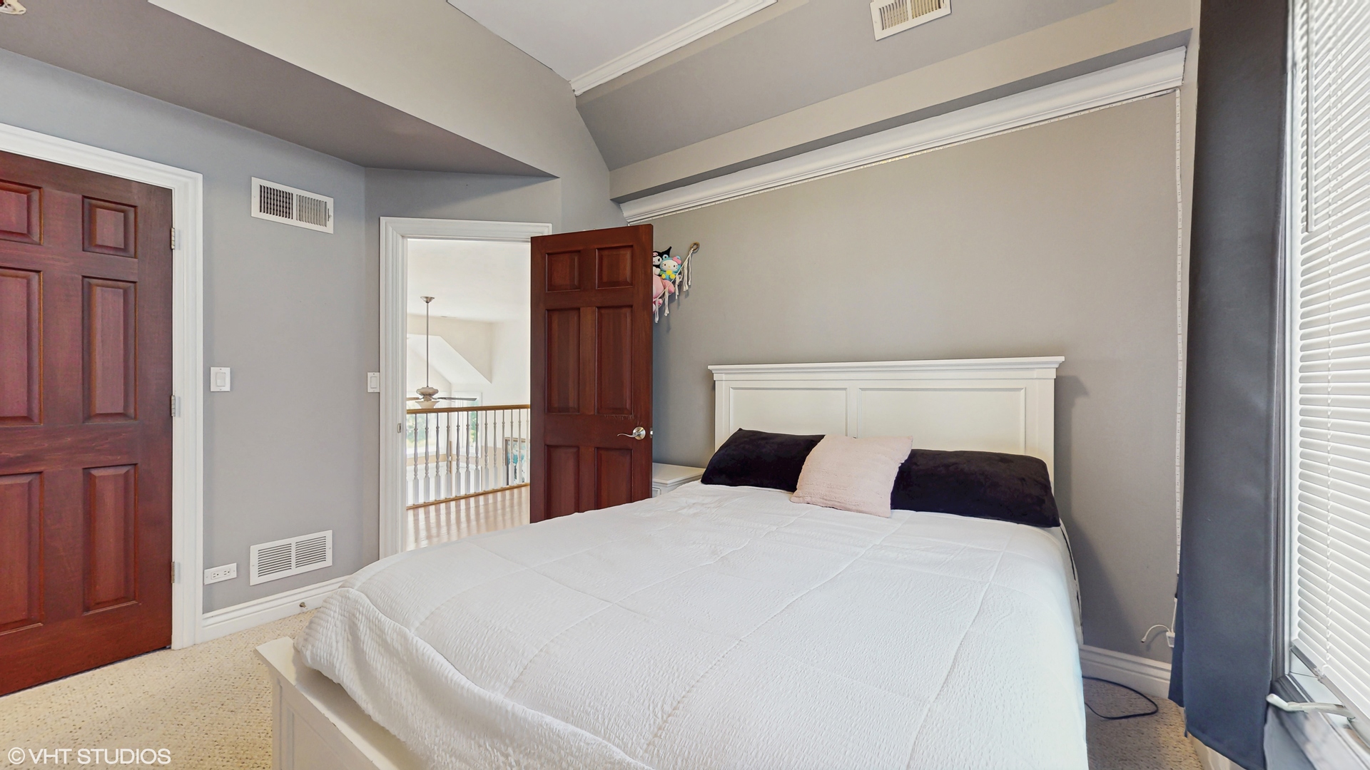 17040 Cheyenne Court Lockport, IL 60441 - Photo 31 of 47 a bedroom with a large bed and wooden floor