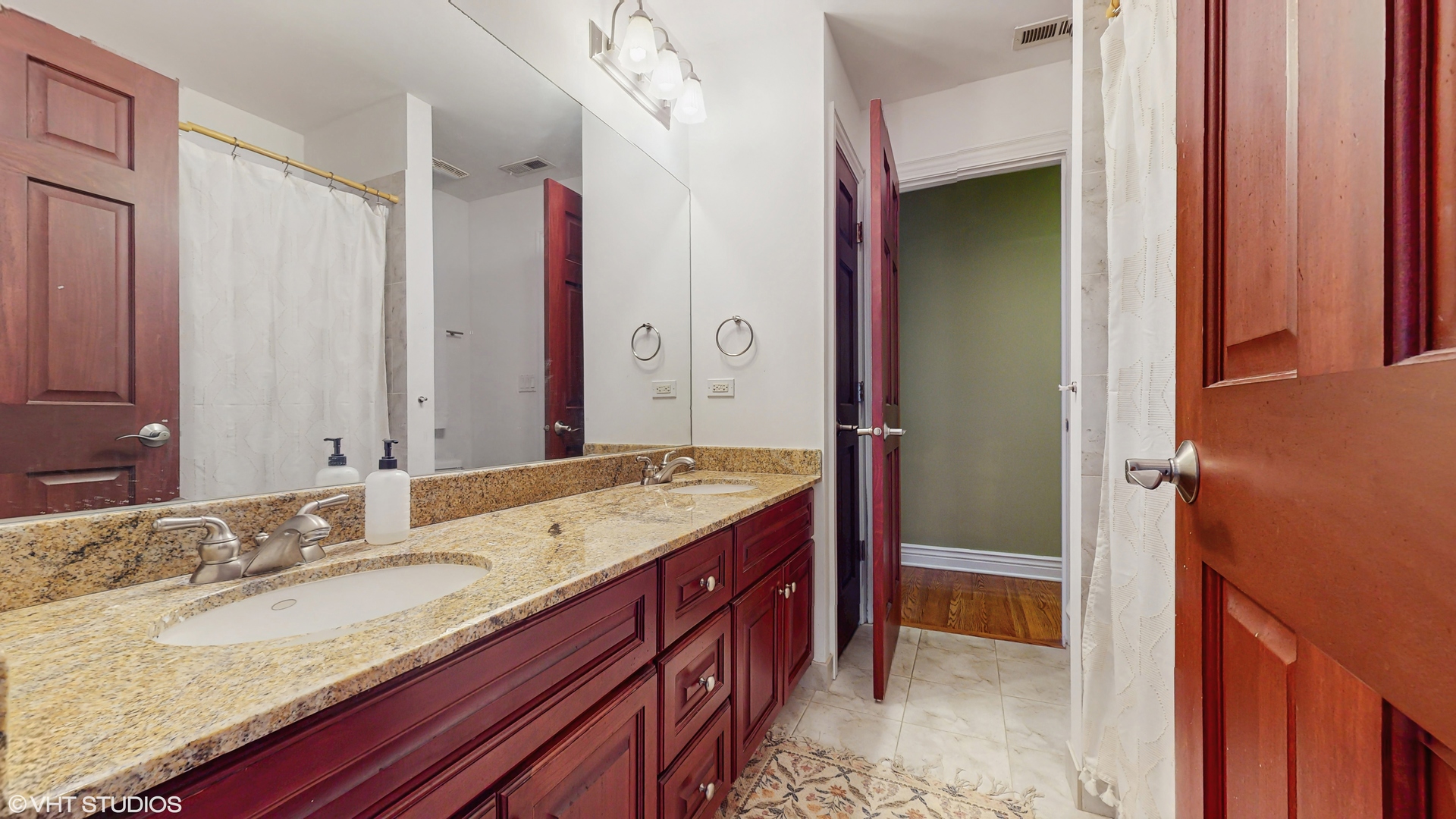 17040 Cheyenne Court Lockport, IL 60441 - Photo 32 of 47 a bathroom with a granite countertop double vanity sink and a mirror