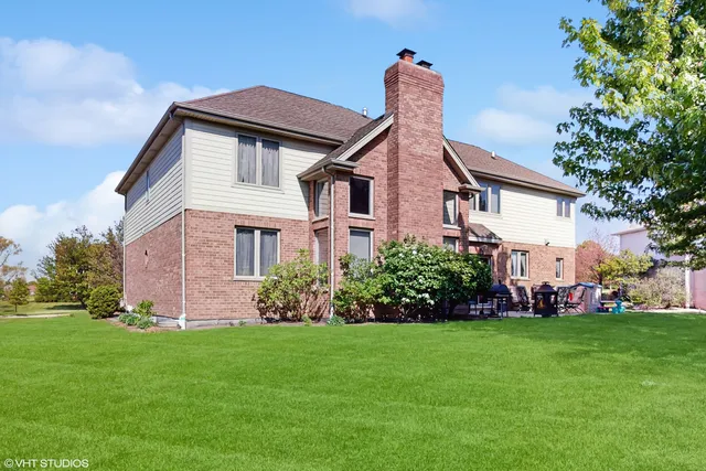 a front view of house with garden