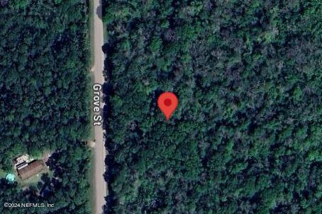 2095 Grove Street Bunnell, FL 32110 - Photo 7 of 7 a view of a house with a yard and sitting area