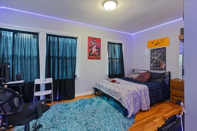 a bedroom with a bed and furniture