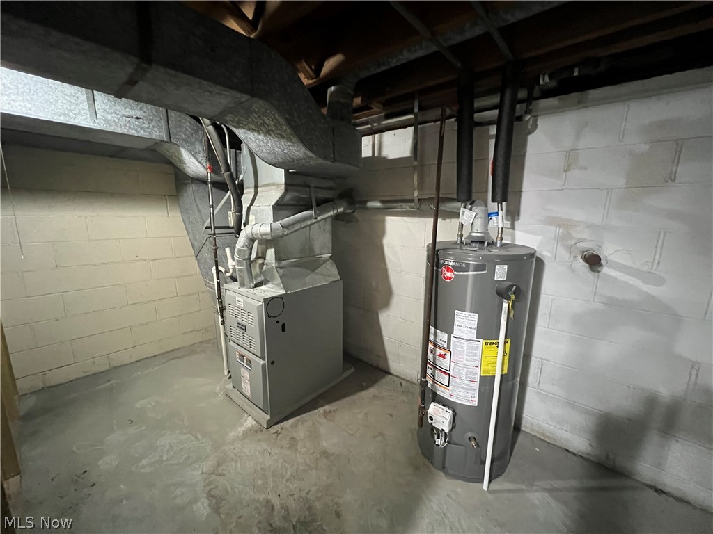 7475 Selwick Drive Parma, OH 44129 - Photo 27 of 29 Utility room with water heater