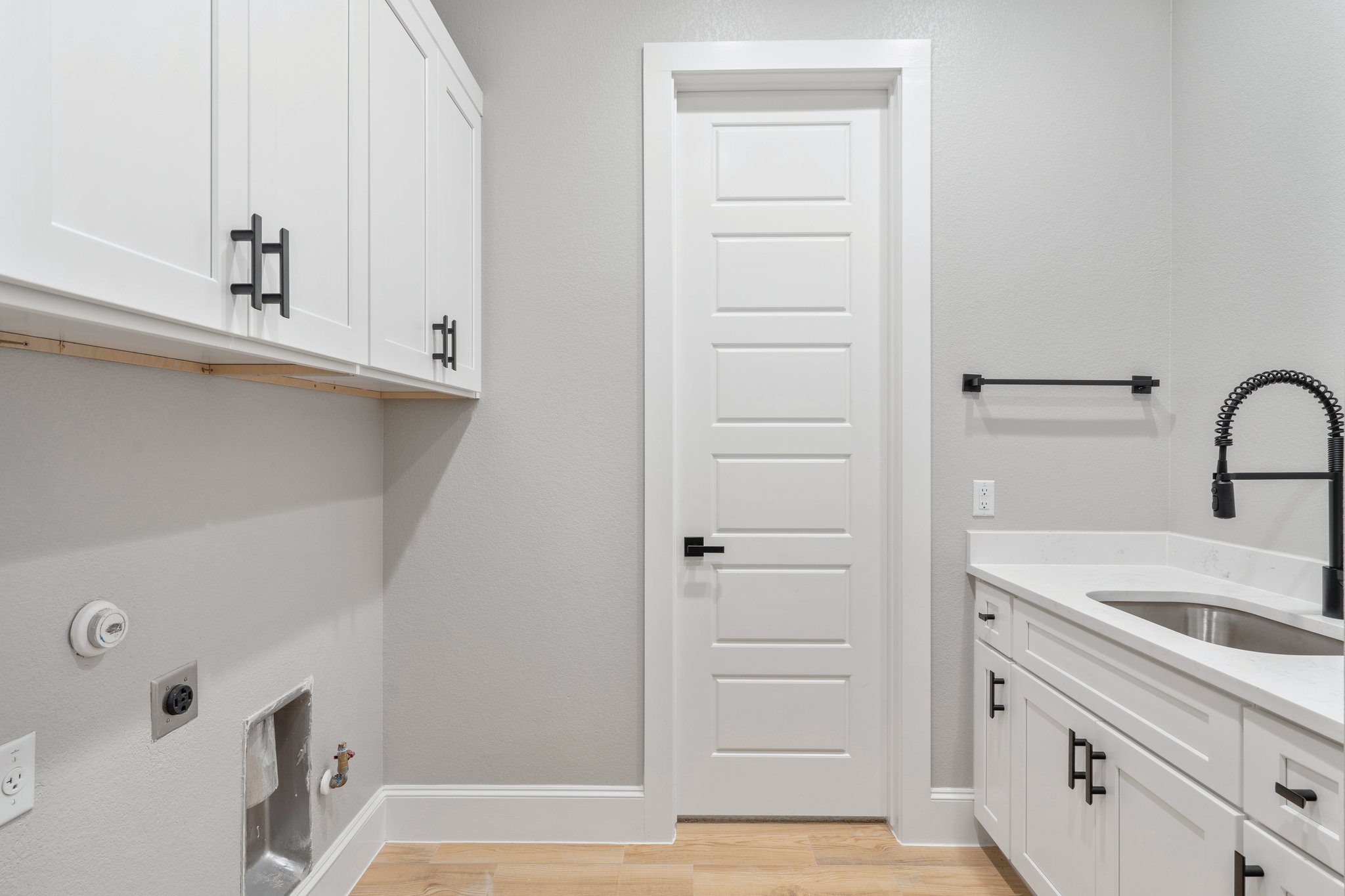 308 Axis Loop Georgetown, TX 78628 - Photo 23 of 40 a view of a kitchen with cabinets