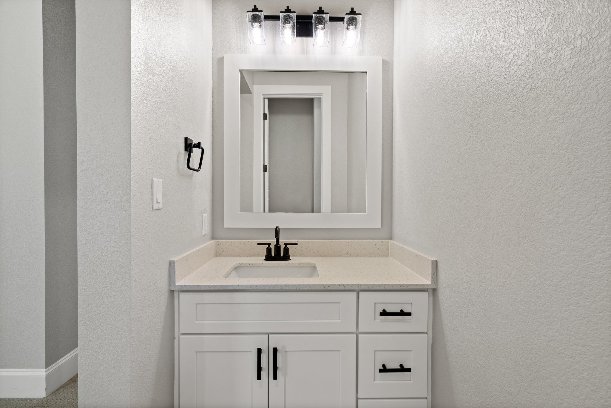 308 Axis Loop Georgetown, TX 78628 - Photo 26 of 40 a bathroom with a sink and a mirror