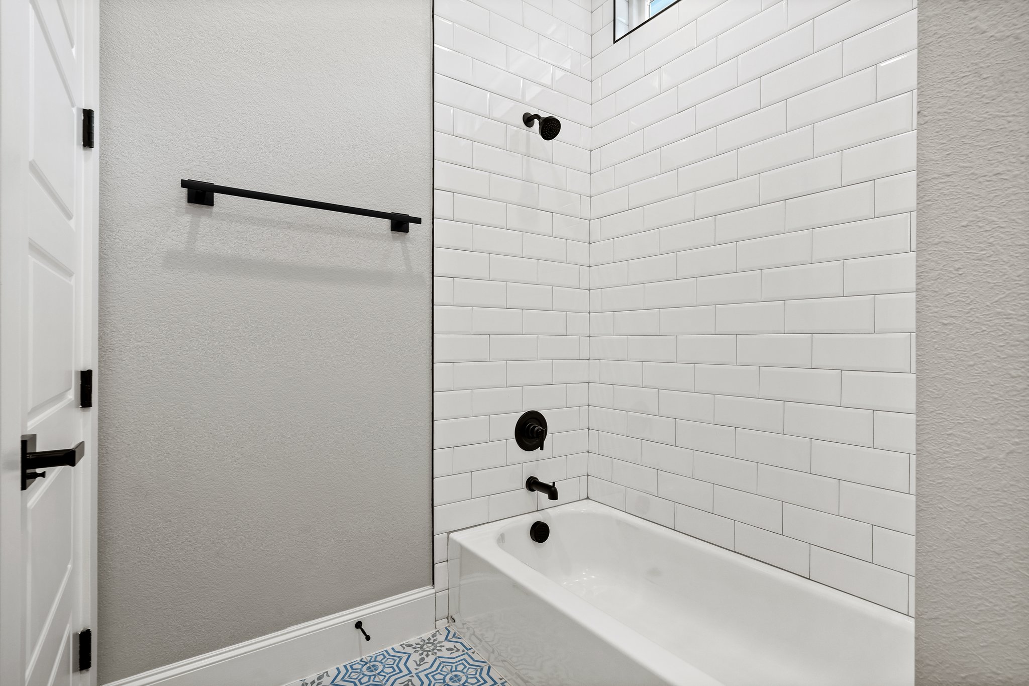 308 Axis Loop Georgetown, TX 78628 - Photo 27 of 40 a bathroom with a bathtub