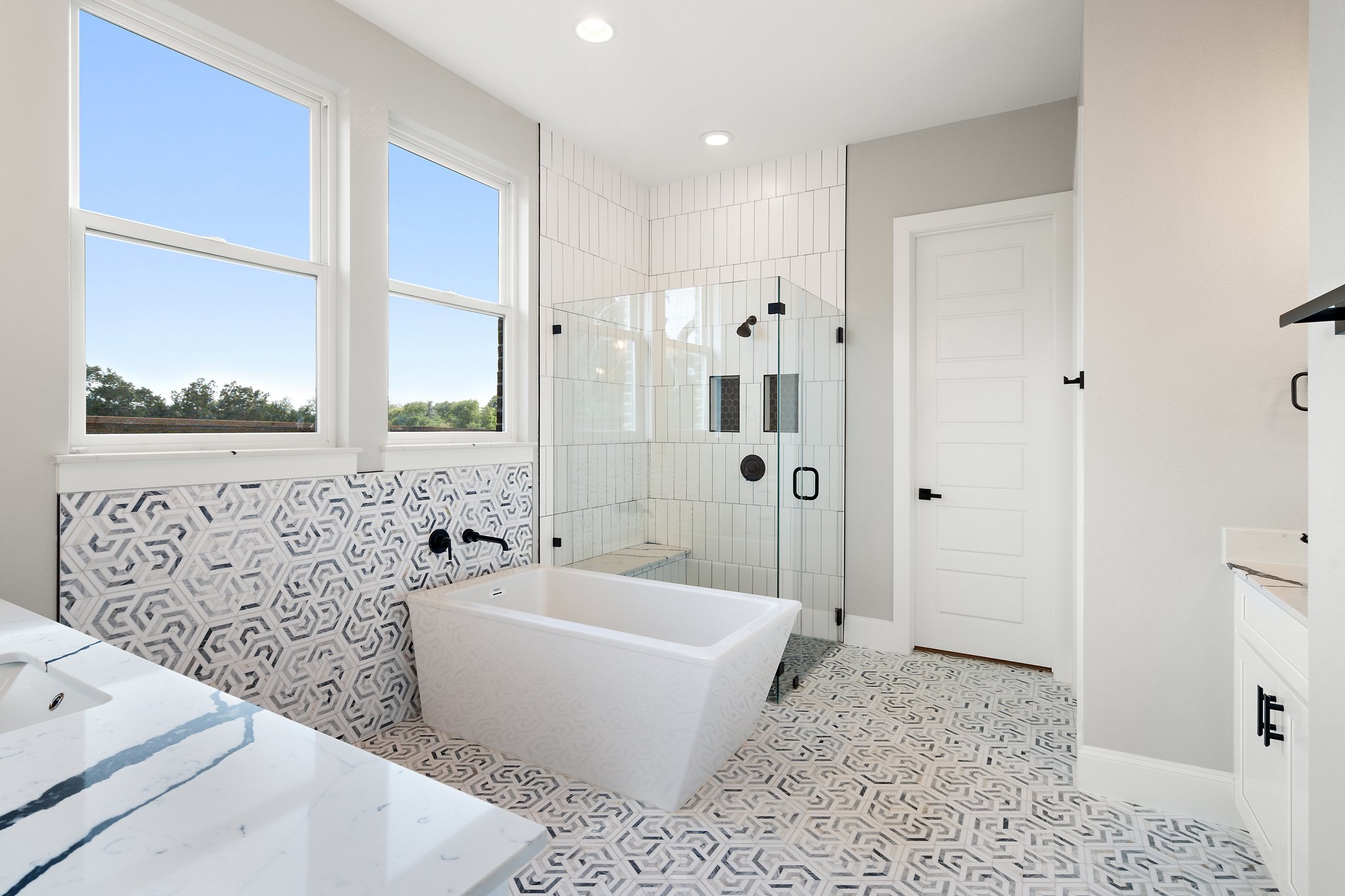 308 Axis Loop Georgetown, TX 78628 - Photo 31 of 40 a spacious bathroom with a bathtub and shower