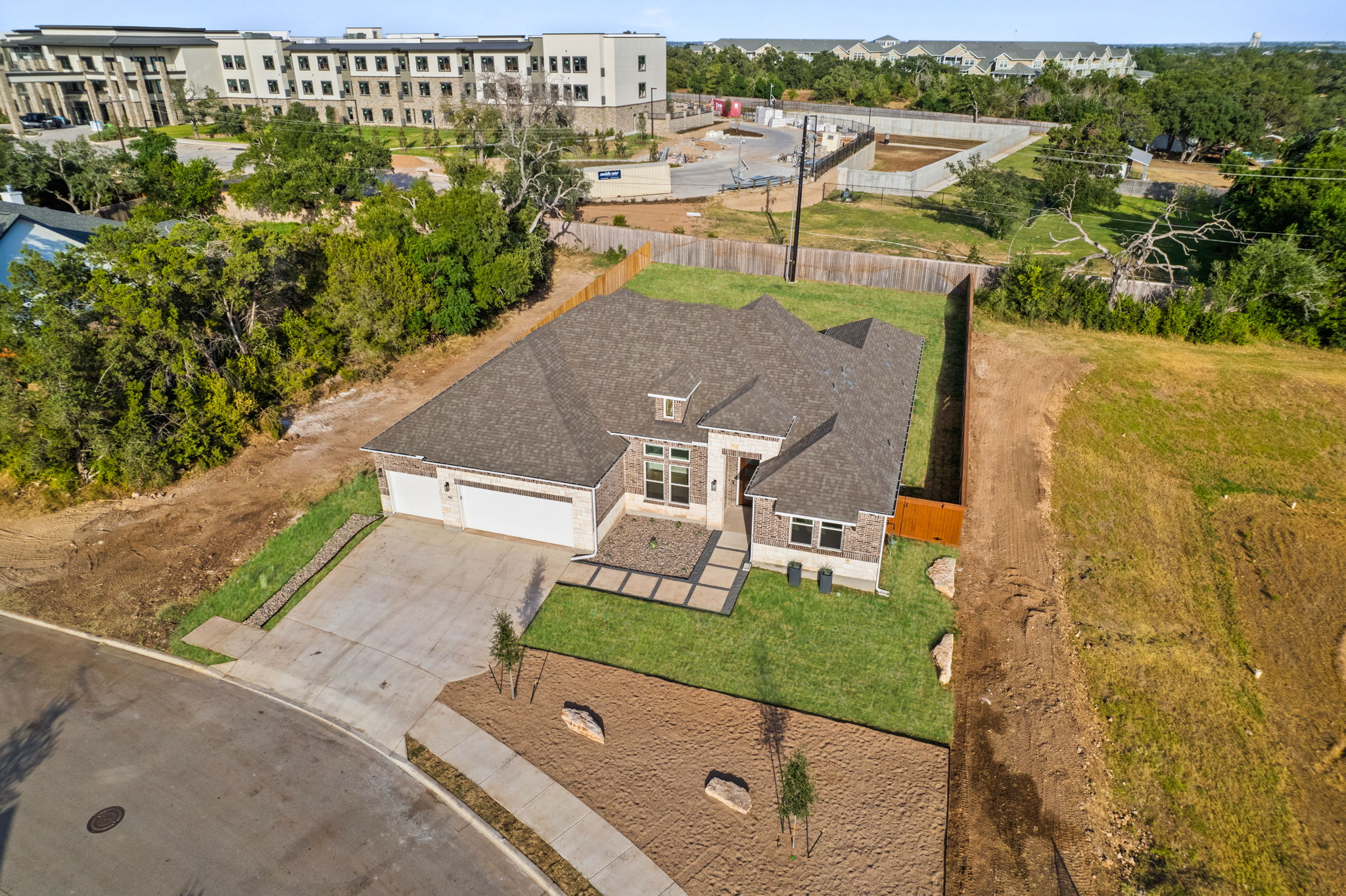 308 Axis Loop Georgetown, TX 78628 - Photo 40 of 40 an aerial view of a house with a garden