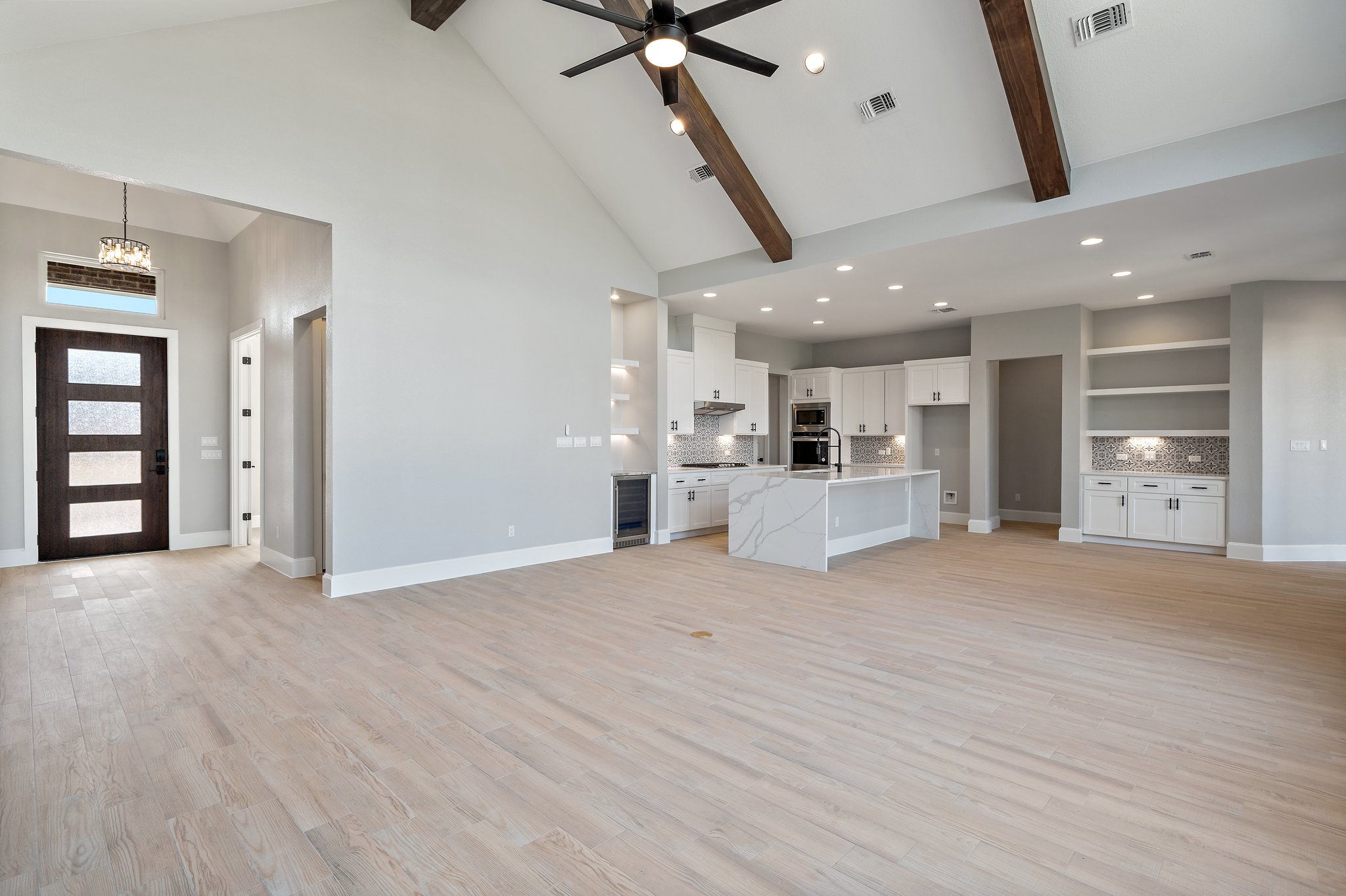 308 Axis Loop Georgetown, TX 78628 - Photo 9 of 40 a view of a kitchen with a sink and a window