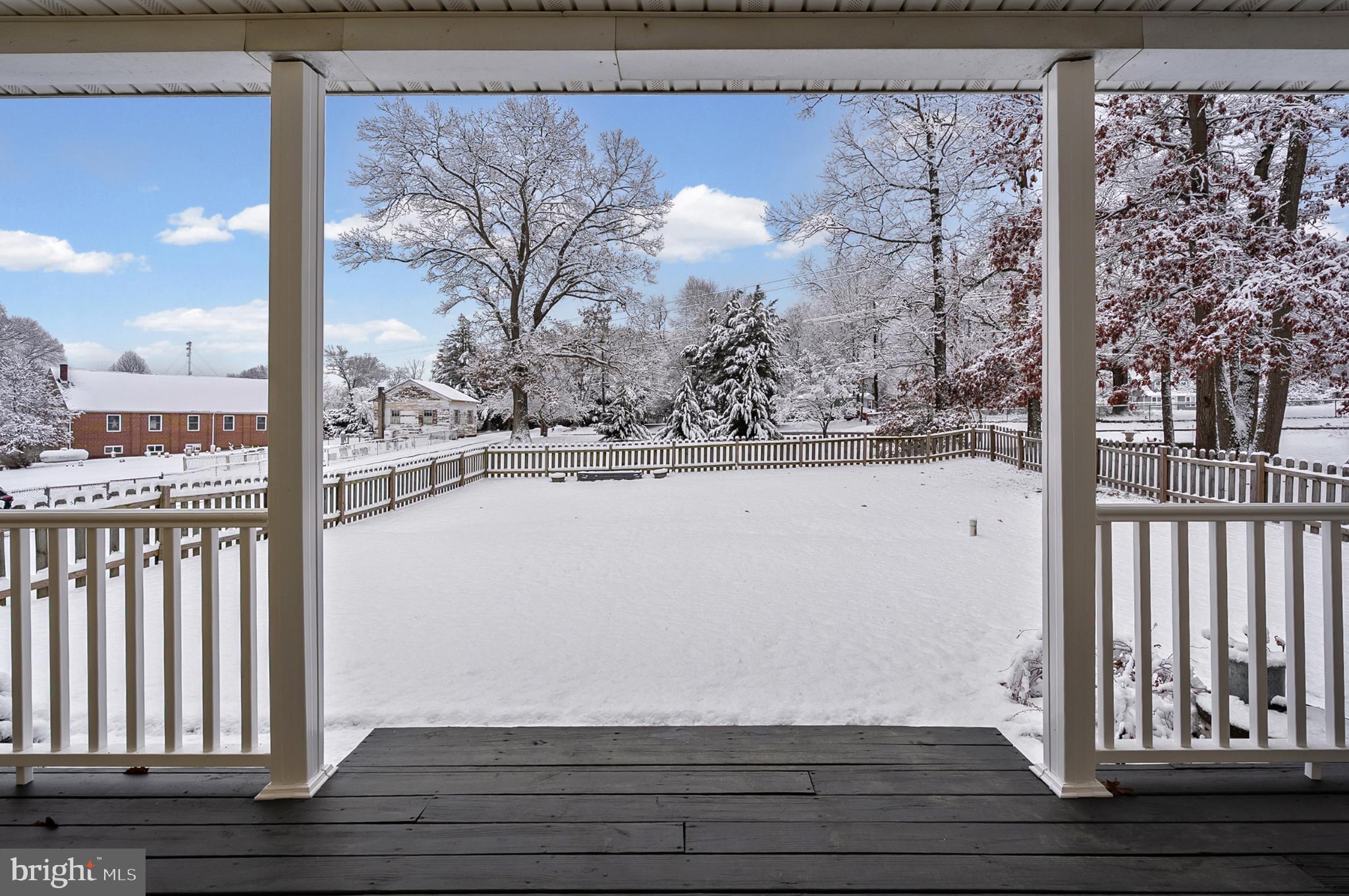 365 Nottingham Road Elkton, MD 21921 - Photo 28 of 50 Winter's serene landscape from a cozy porch.