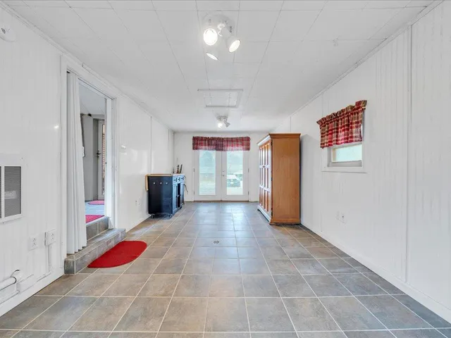 a view of livingroom with furniture and cabinet