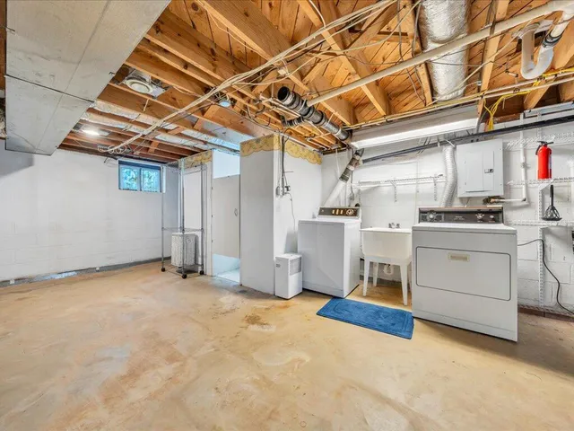 a view of a room with storage and utility room