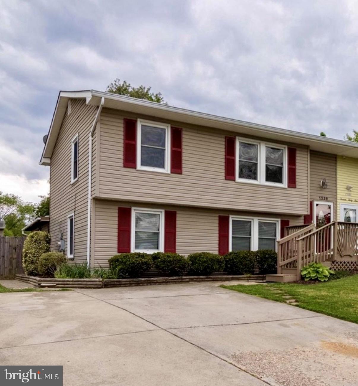 1332 Tenbrook Road Odenton, MD 21113 - Photo 1 of 1 a front view of house with yard and green space