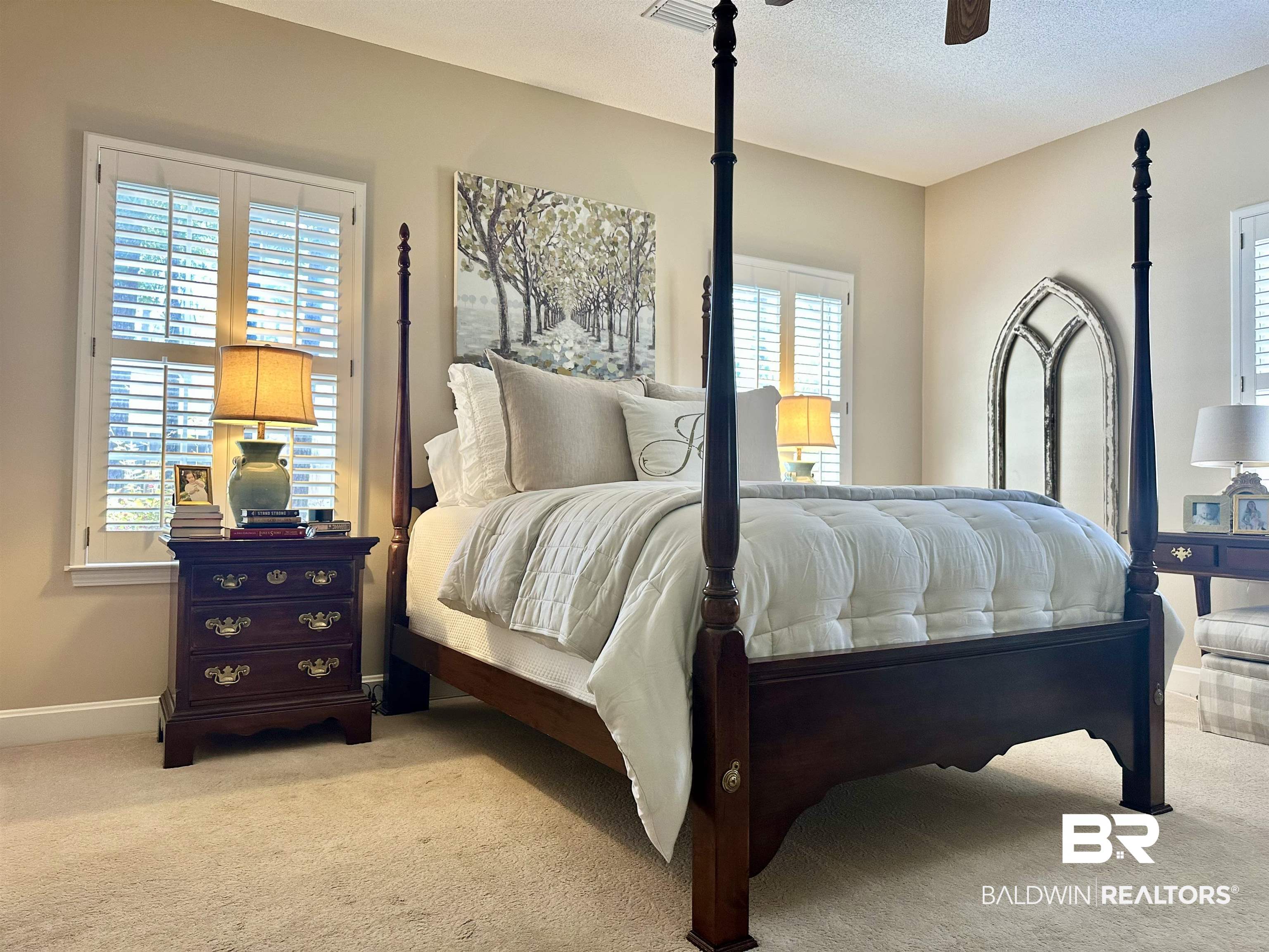 148 Brooks Boulevard Brewton, AL 36426 - Photo 17 of 45 Carpeted bedroom with a textured ceiling, baseboards, and a ceiling fan